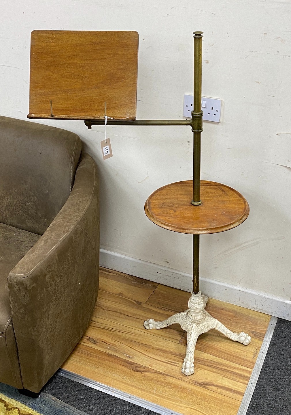 A Victorian mahogany brass and cast iron adjustable reading table, height 122cm